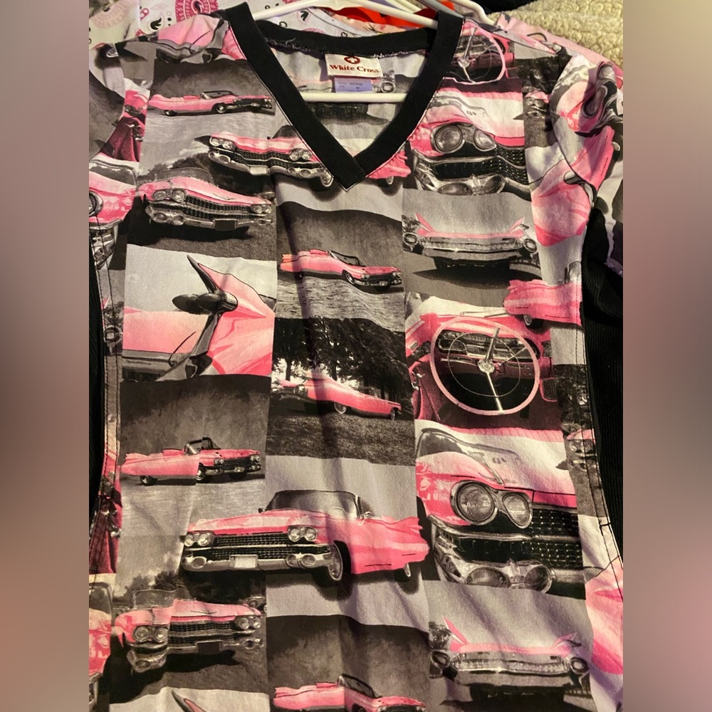 Women’s scrub top, size small but fits like XS